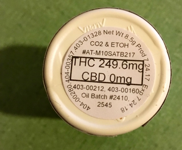 Top of Altus Sativa pills showing expiration date and THC and CBD content.