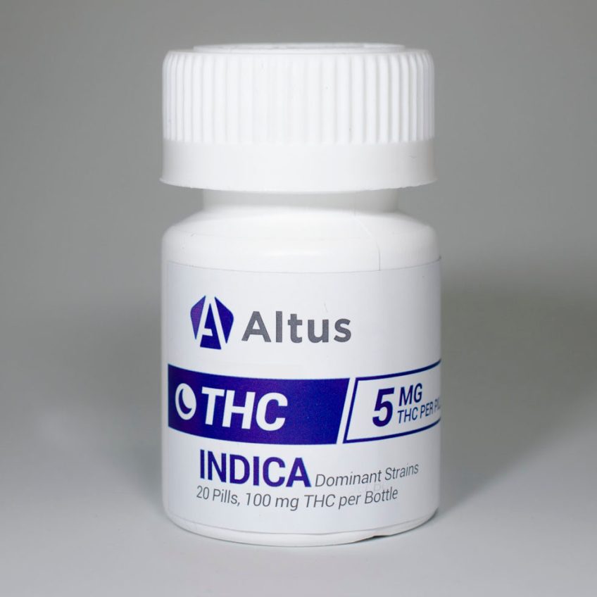 White bottle of Altus THC Indica pills. Cannabis edibles.