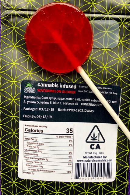 Natural Cannabis Company Watermelon THC Sucker package with sucker laying on top of the package