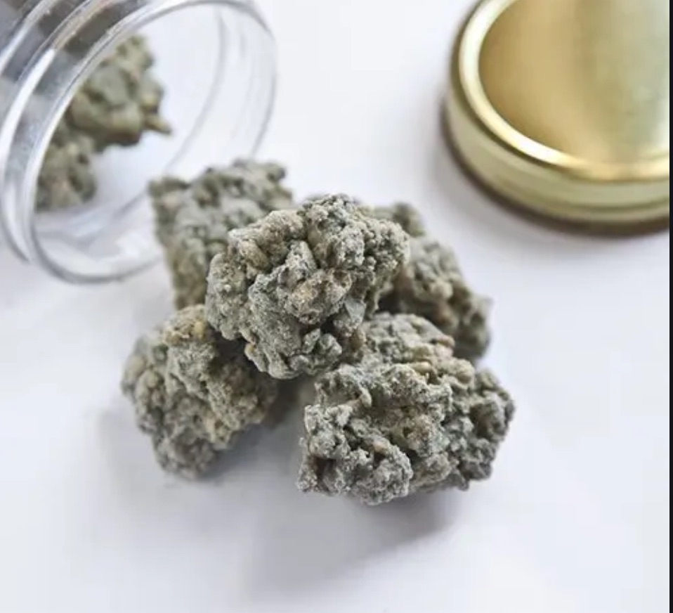 koko nuggz thc cannabis infused green colored cocoa covered cereal treats in the shape of cannabis buds